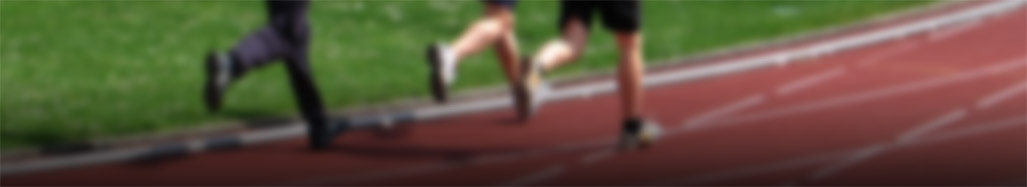 blurred photo of Men's Track and Field action