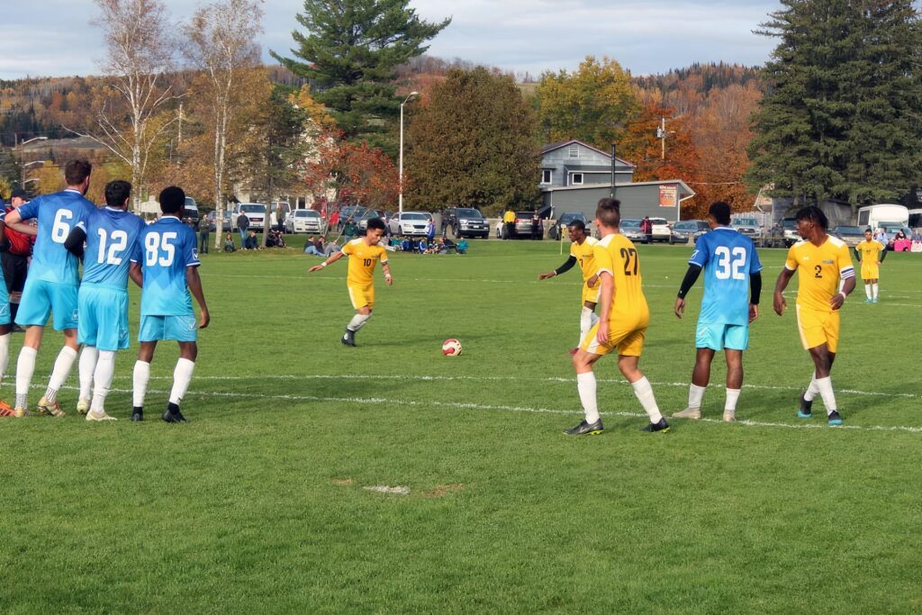 Bengals lining up for the free kick against Bryant & Stratton College in their win Saturday.