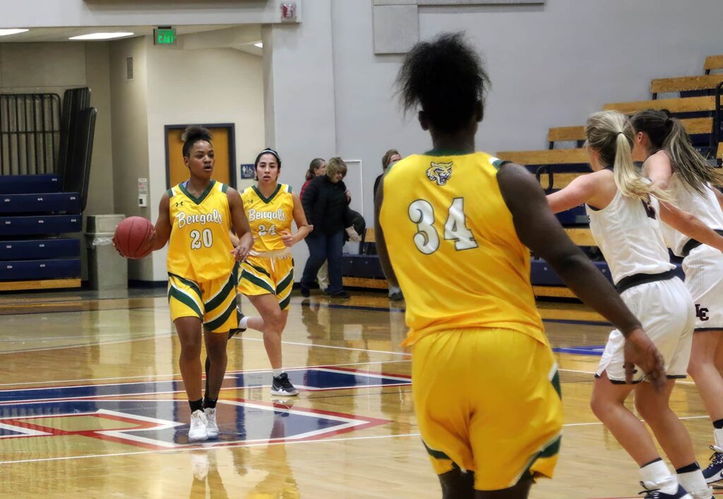 Ranika Guyton bringing up the ball against Lewis-Clark State in Lewiston, Idaho.