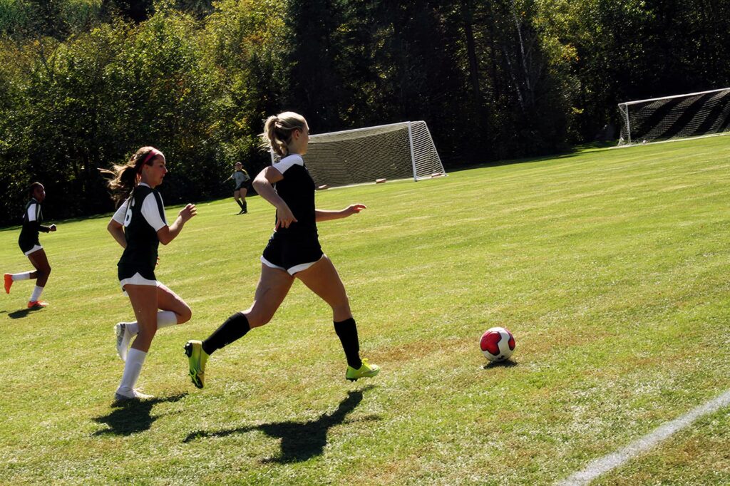 Bengal Women's Soccer players chasing down a ball during a Sunday scrimmage.