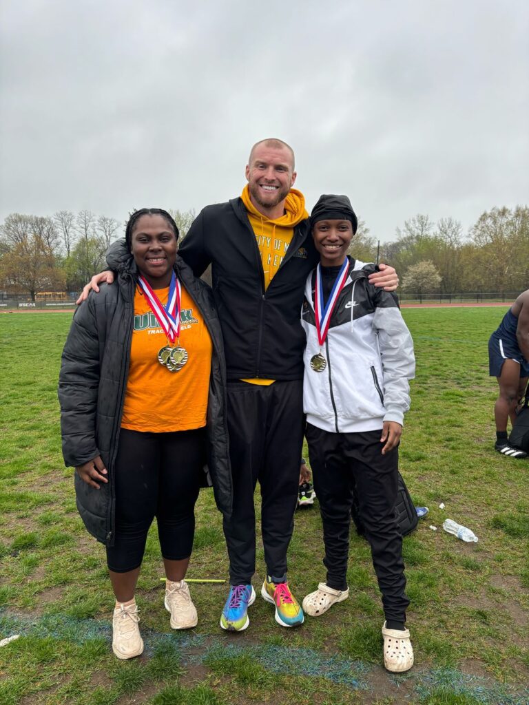 Coach Davis Cyr, Georgia Burton, and Kamoy Brown